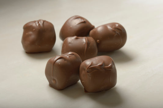 Milk Chocolate Covered Marshmallows - A delightful blend of sweetness and softness for indulgent snacking.