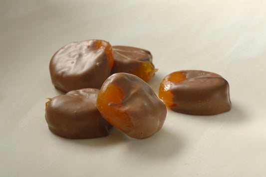 Chocolate Covered Apricots - Succulent Australian apricots dipped in premium milk chocolate for a delectable treat.