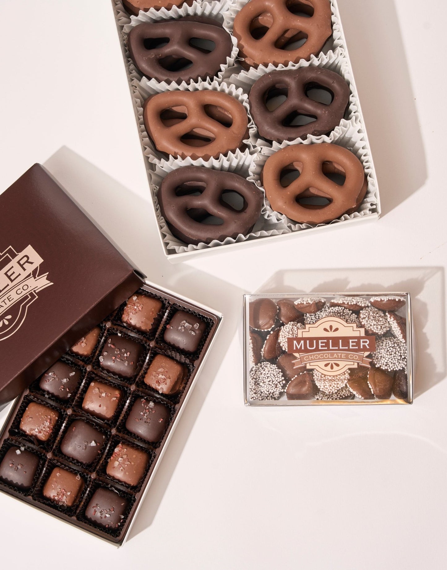 Salt and Sweet Gift tower featuring chocolate covered pretzels, sea salt caramels and nonpariels