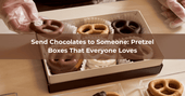 Box of handmade chocolate covered pretzels being packed for delivery – send chocolates to someone nationwide