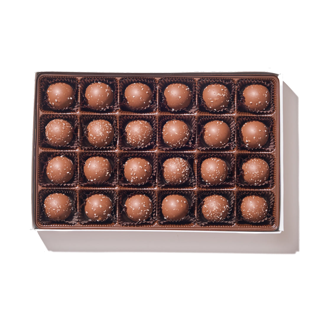 Milk Chocolate Sea Salt Caramel Truffle Gift Box – 24 sea salt caramel–flavored ganache truffles in creamy milk chocolate.
