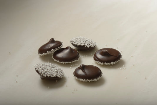 Dark chocolate white seed nonpareils | Mueller Chocolate Co.