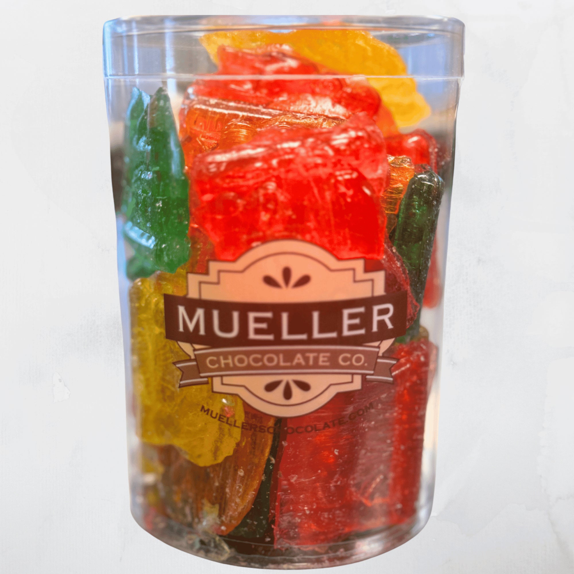 1 lb tub of classic clear toy candy filled with traditional barley sugar candies, perfect for holiday gifting or nostalgic treats.