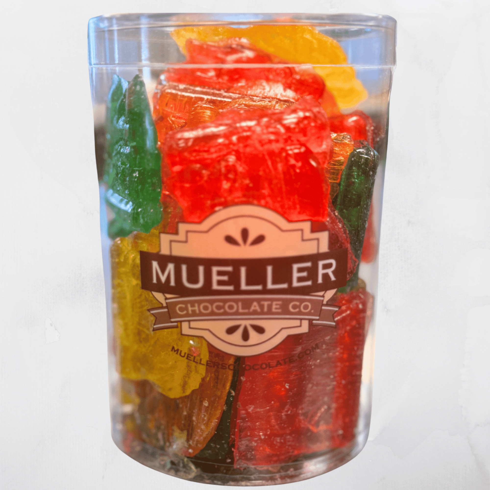 1 lb tub of classic clear toy candy filled with traditional barley sugar candies, perfect for holiday gifting or nostalgic treats.