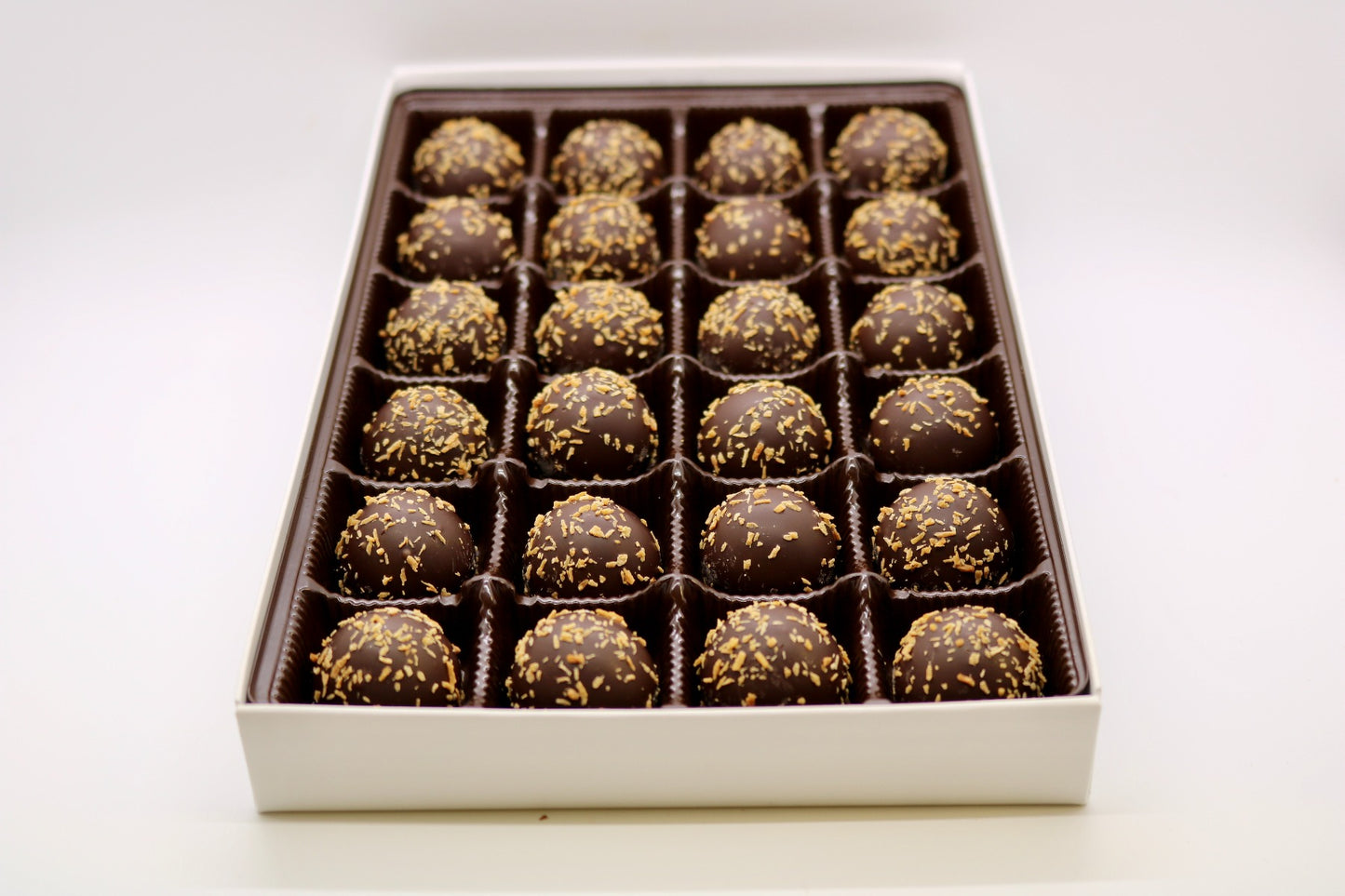 Delight in the Decadence of Mueller's Dark Chocolate Coconut Truffles - Box of 24