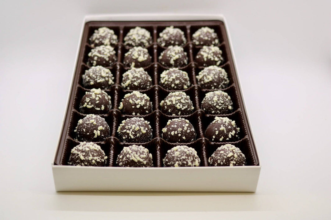 Dark Chocolate Rum Truffles with rum-flavored dark ganache, coated in dark chocolate.