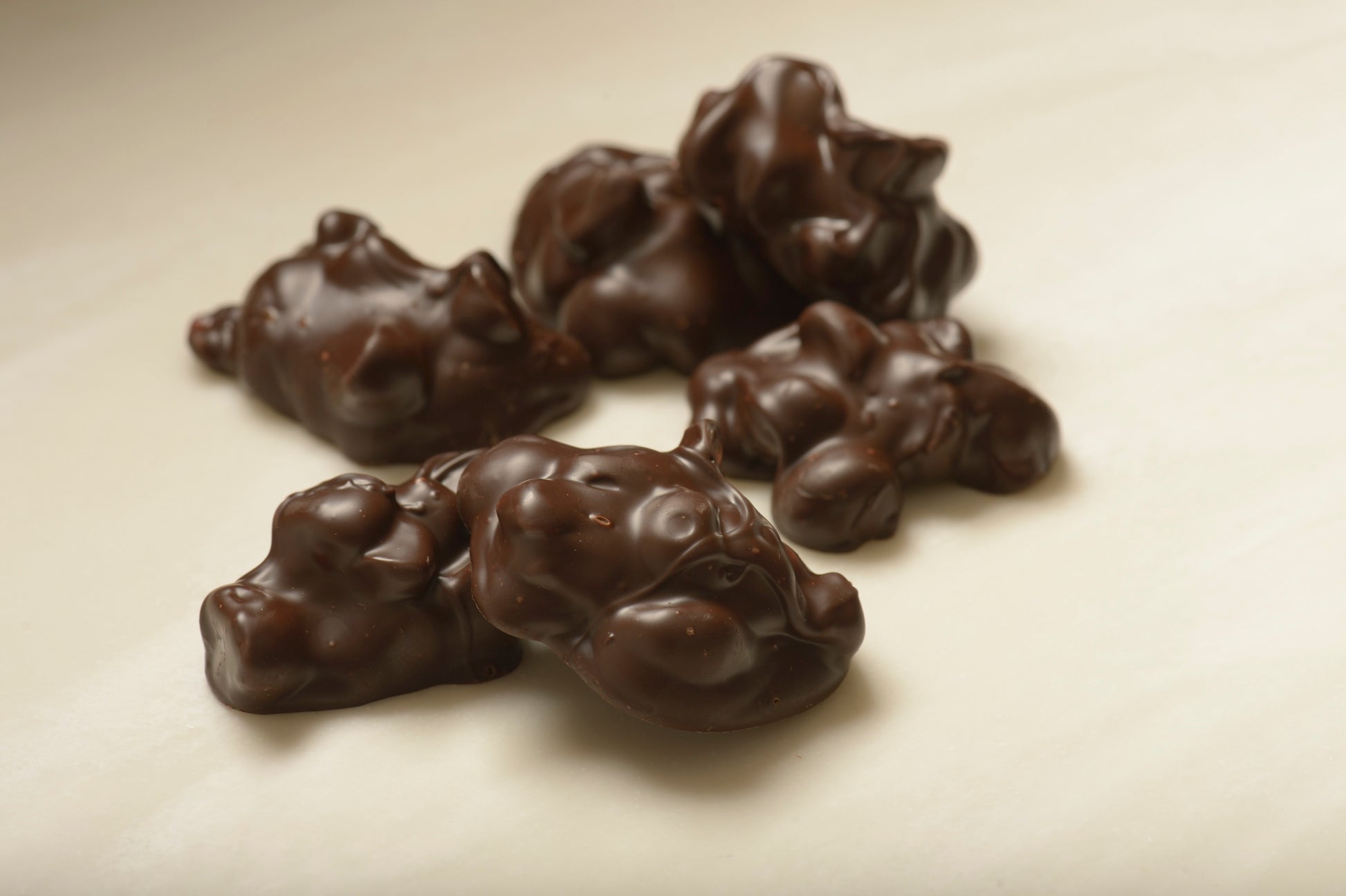 Gourmet Dark Chocolate Macadamia Clusters | Mueller Chocolate Co.