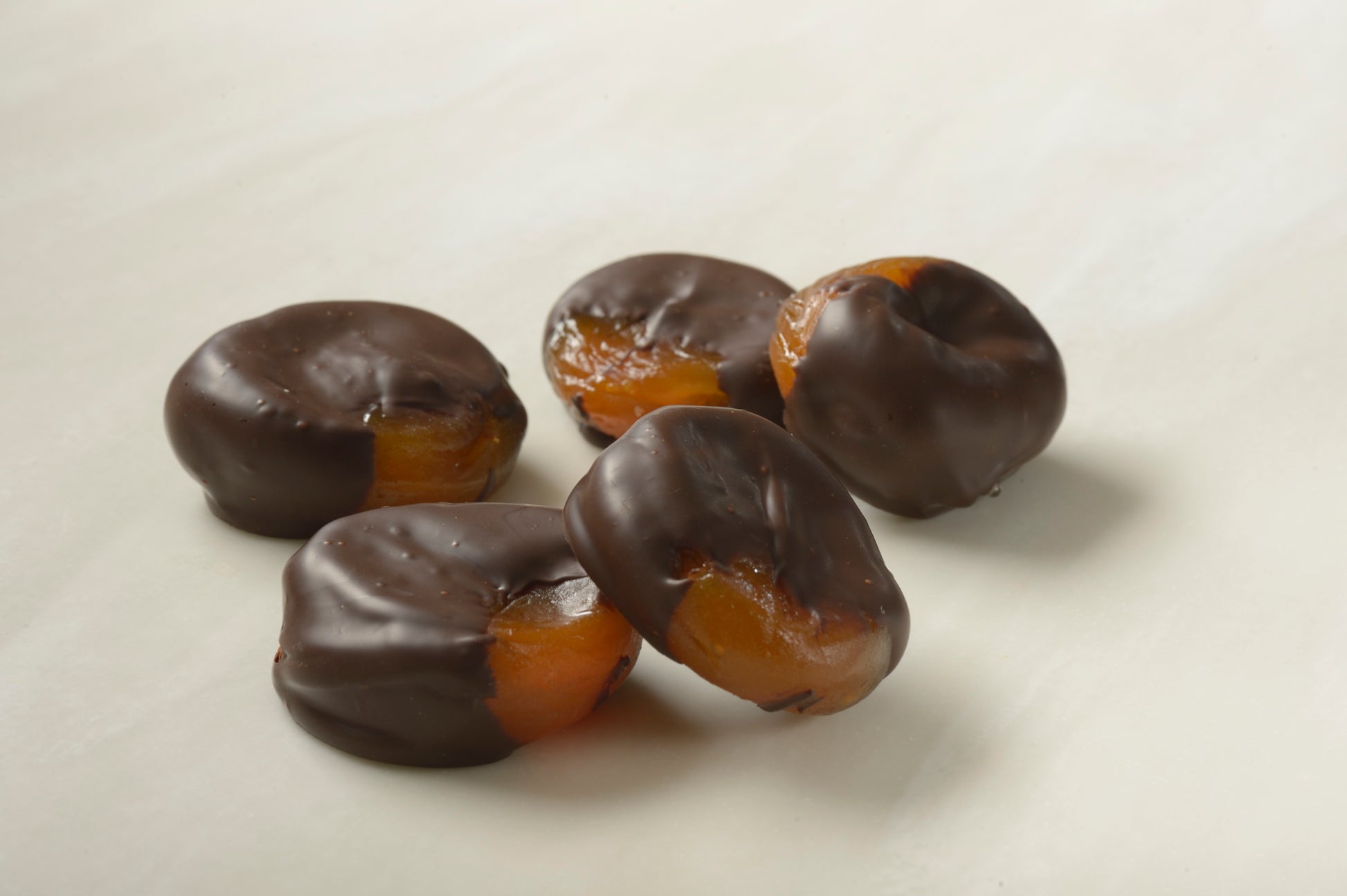 Dark Chocolate Glazed Apricots - succulent Australian apricots hand-dipped in rich dark chocolate by skilled chocolatiers