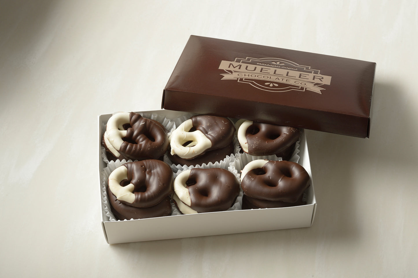 Half-Dipped White & Dark Chocolate Pretzels | Mueller Chocolate Co.